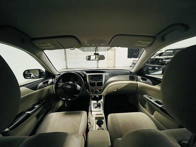 Photo of 2009 White Subaru Impreza
