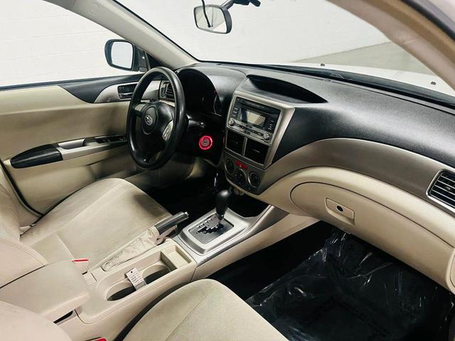 Photo of 2009 White Subaru Impreza