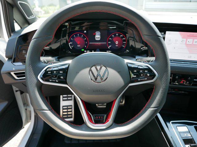 Photo of 2024 Opal White Pearl Volkswagen Golf GTI