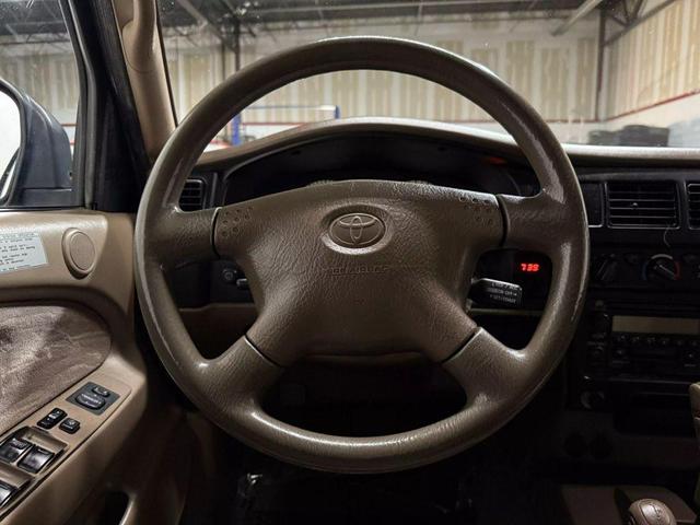 Photo of 2003 Green Toyota Tacoma