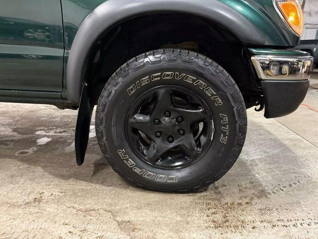 Photo of 2003 Green Toyota Tacoma