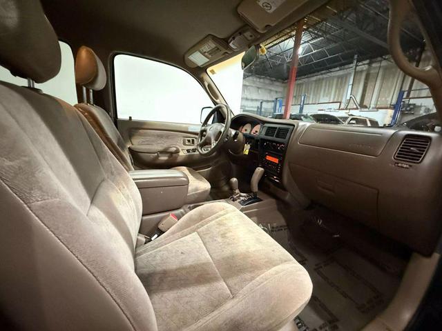 Photo of 2003 Green Toyota Tacoma