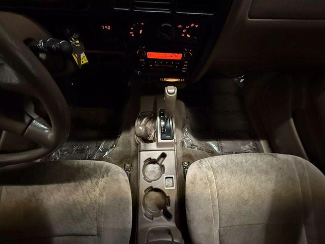 Photo of 2003 Green Toyota Tacoma