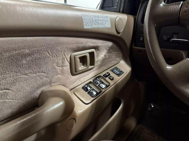 Photo of 2003 Green Toyota Tacoma