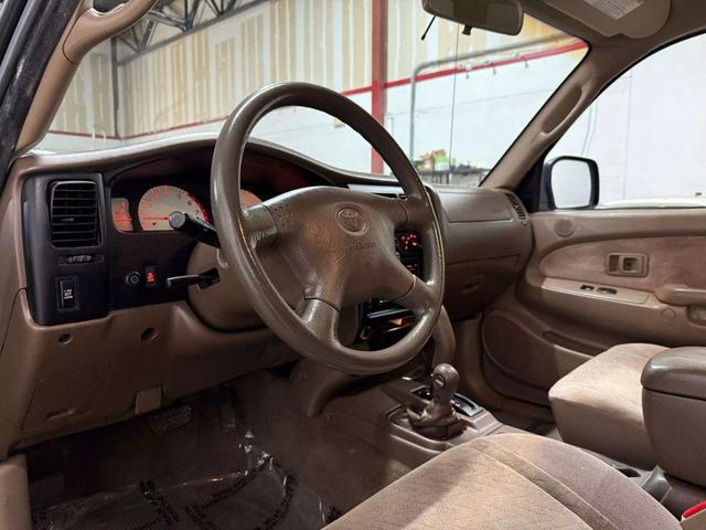 Photo of 2003 Green Toyota Tacoma
