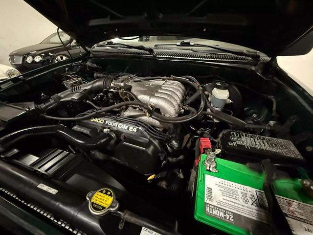 Photo of 2003 Green Toyota Tacoma