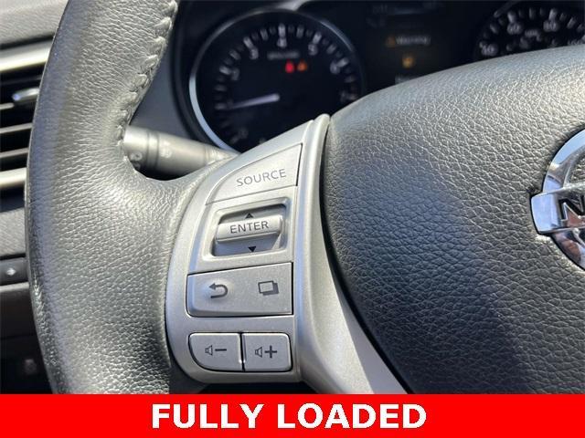 Photo of 2016 Midnight Jade Nissan Rogue