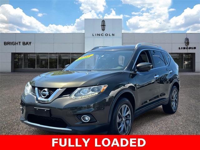 Photo of 2016 Midnight Jade Nissan Rogue