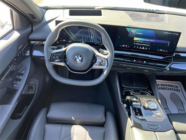 Photo of 2024 Mineral White Metallic BMW 530