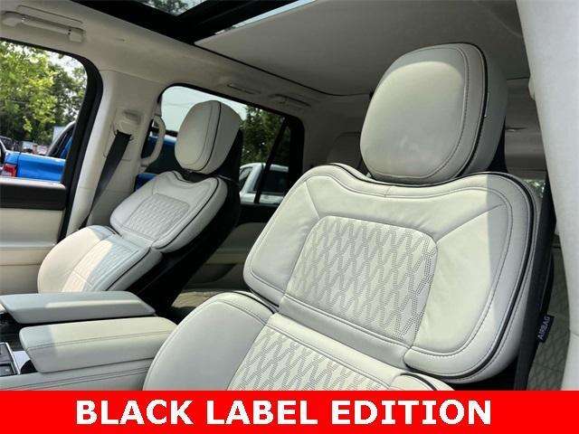 Photo of 2024 Pristine White Lincoln Navigator L