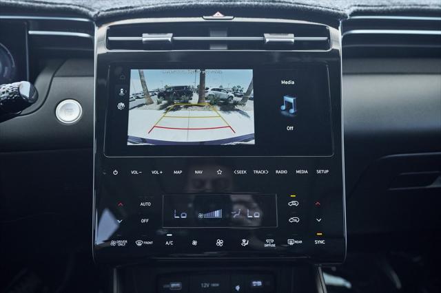 Photo of 2023 Deep Sea Hyundai TUCSON Hybrid