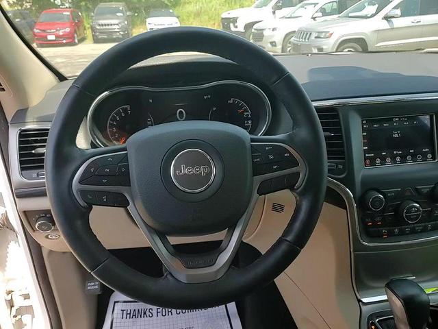 Photo of 2021 Bright White Clearcoat Jeep Grand Cherokee