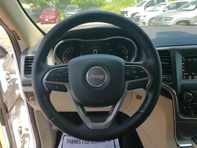 Photo of 2021 Bright White Clearcoat Jeep Grand Cherokee