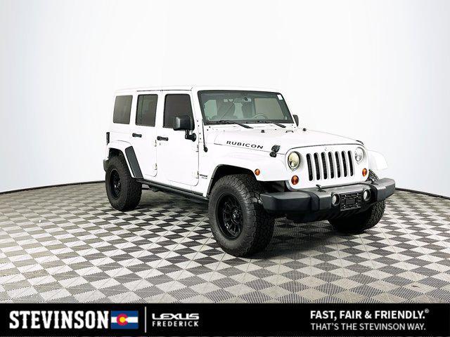 Photo of 2012 Bright White Jeep Wrangler Unlimited