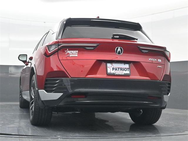 Photo of 2024 Scarlet Red Metallic Acura ZDX