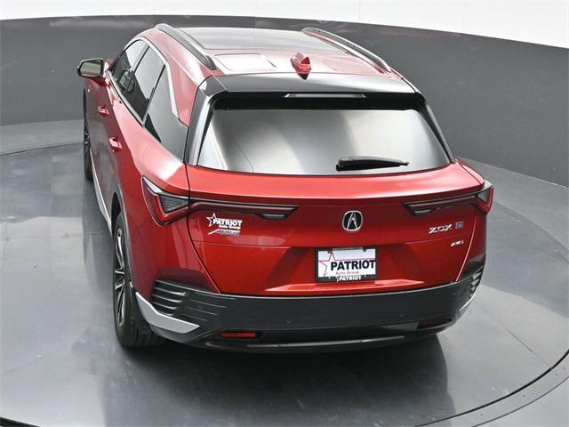 Photo of 2024 Scarlet Red Metallic Acura ZDX