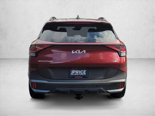 Photo of 2023 Dawning Red Kia Sportage