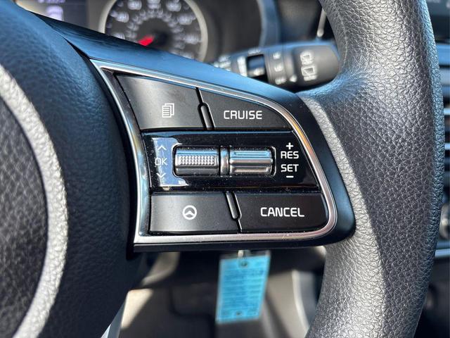 Photo of 2023 Cherry Black Kia Seltos