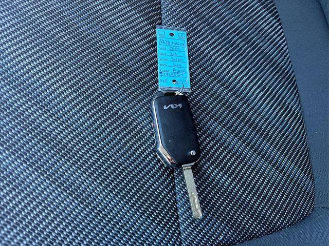 Photo of 2023 Cherry Black Kia Seltos