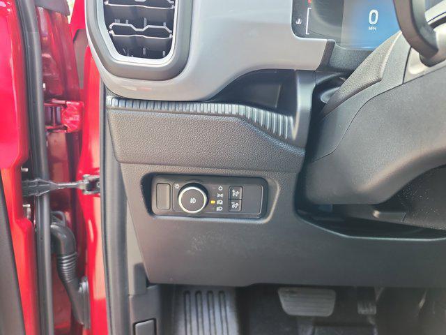Photo of 2025 Ruby Red Metallic Tinted Clearcoat Ford Ranger