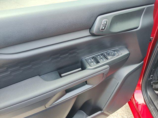 Photo of 2025 Ruby Red Metallic Tinted Clearcoat Ford Ranger
