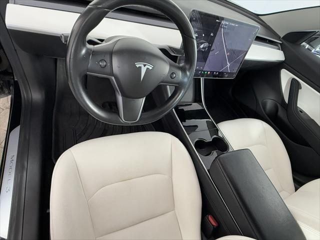 Photo of 2019 Solid Black Tesla Model 3