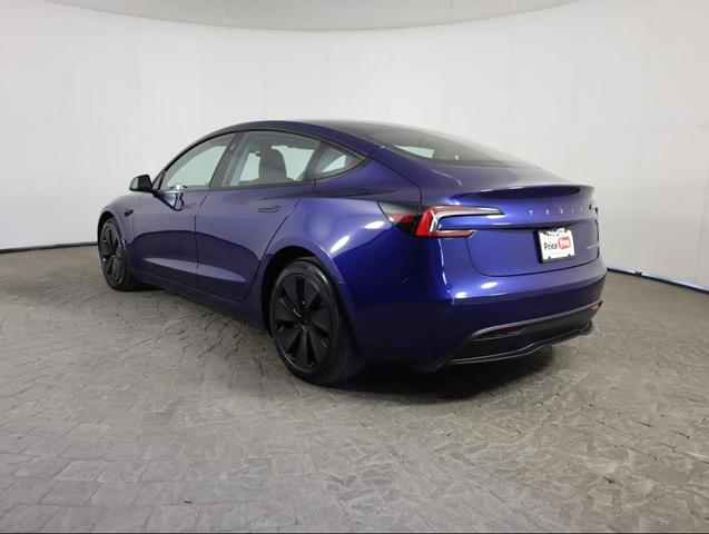 Photo of 2024 Deep Blue Metallic Tesla Model 3