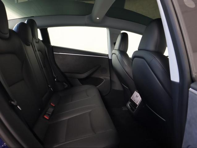 Photo of 2024 Deep Blue Metallic Tesla Model 3