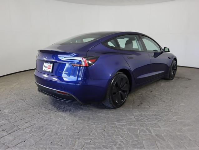 Photo of 2024 Deep Blue Metallic Tesla Model 3