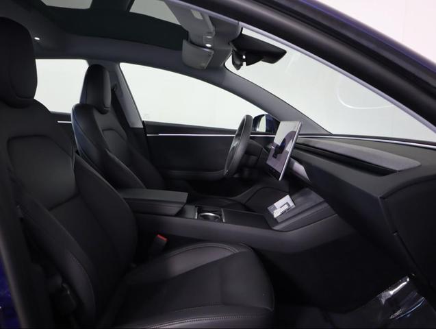 Photo of 2024 Deep Blue Metallic Tesla Model 3