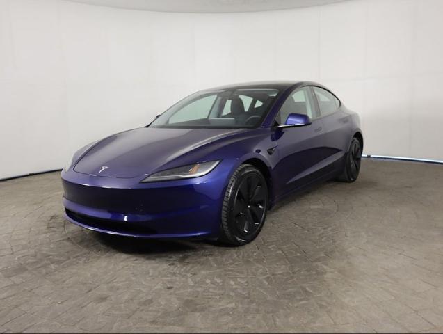 Photo of 2024 Deep Blue Metallic Tesla Model 3