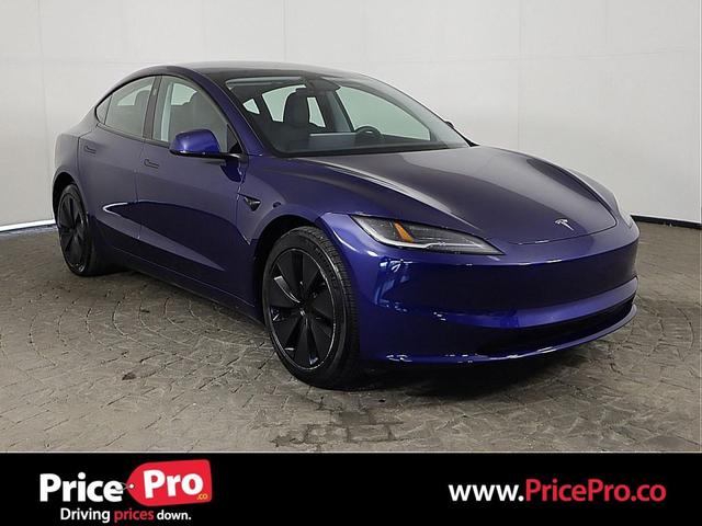 Photo of 2024 Deep Blue Metallic Tesla Model 3