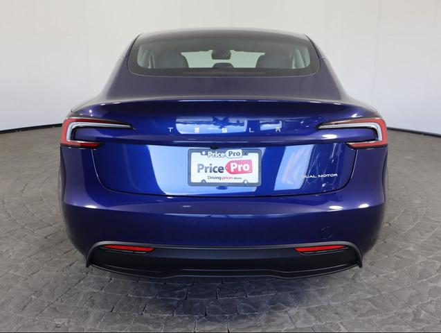 Photo of 2024 Deep Blue Metallic Tesla Model 3