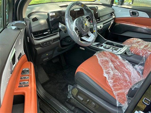 Photo of 2026 Deep Chroma Blue Kia Carnival Hybrid