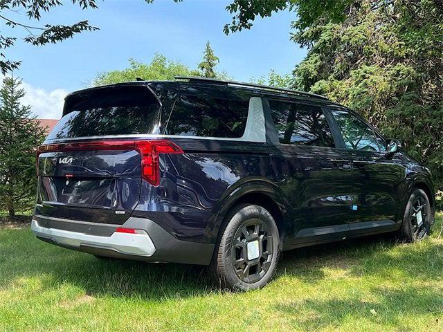 Photo of 2026 Deep Chroma Blue Kia Carnival Hybrid