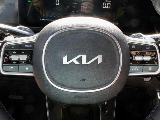 Photo of 2025 Deep Chroma Blue Kia Carnival Hybrid