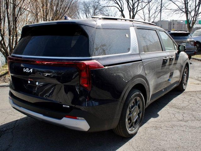 Photo of 2025 Deep Chroma Blue Kia Carnival Hybrid