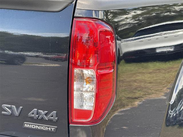 Photo of 2021 Magnetic Black Pearl Nissan Frontier
