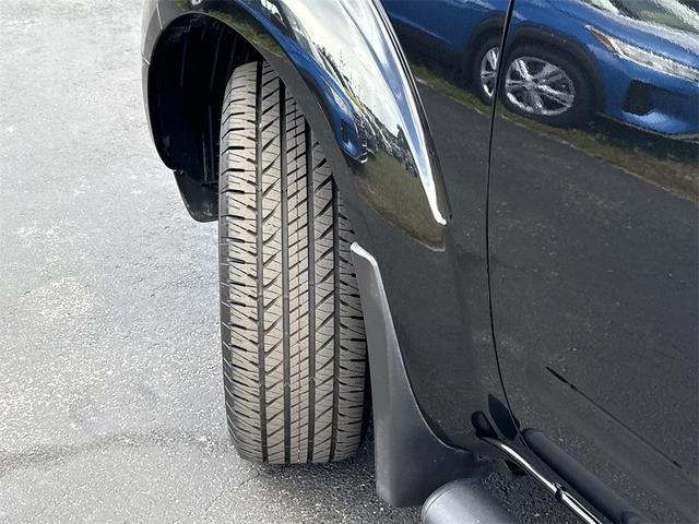 Photo of 2021 Magnetic Black Pearl Nissan Frontier