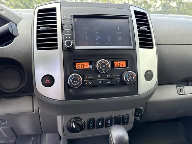 Photo of 2021 Magnetic Black Pearl Nissan Frontier
