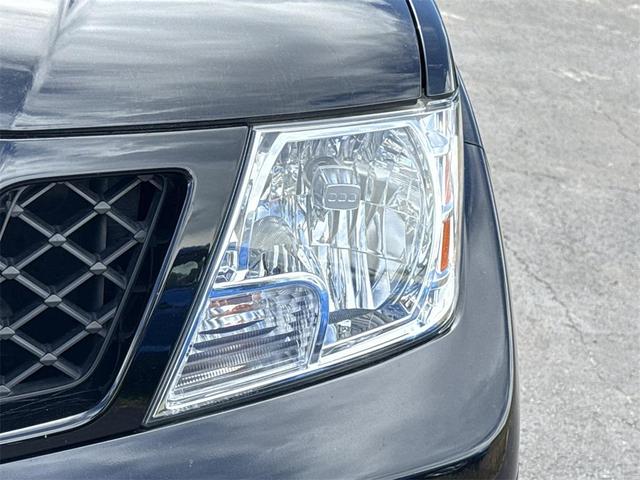 Photo of 2021 Magnetic Black Pearl Nissan Frontier