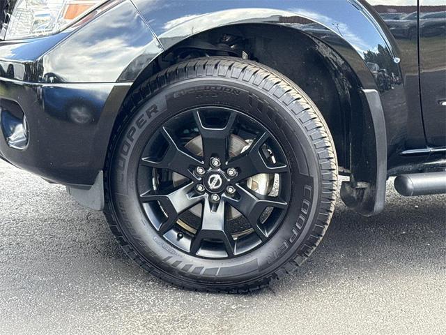 Photo of 2021 Magnetic Black Pearl Nissan Frontier