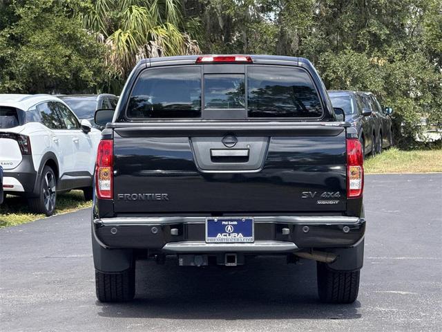 Photo of 2021 Magnetic Black Pearl Nissan Frontier