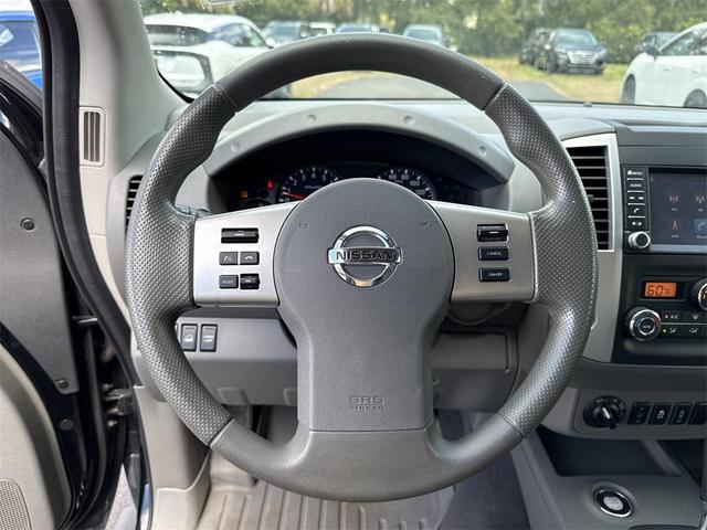 Photo of 2021 Magnetic Black Pearl Nissan Frontier