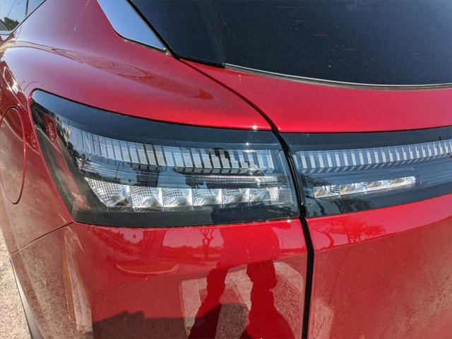Photo of 2025 Scarlet Ember Tintcoat/Super Black Nissan Murano