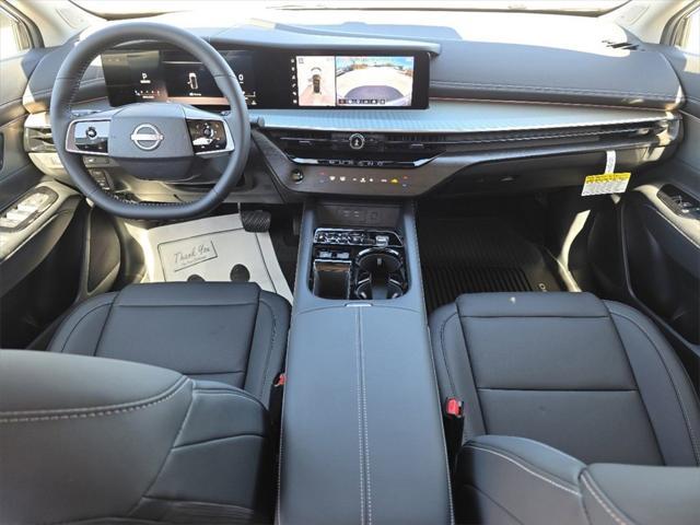 Photo of 2025 Scarlet Ember Tintcoat/Super Black Nissan Murano