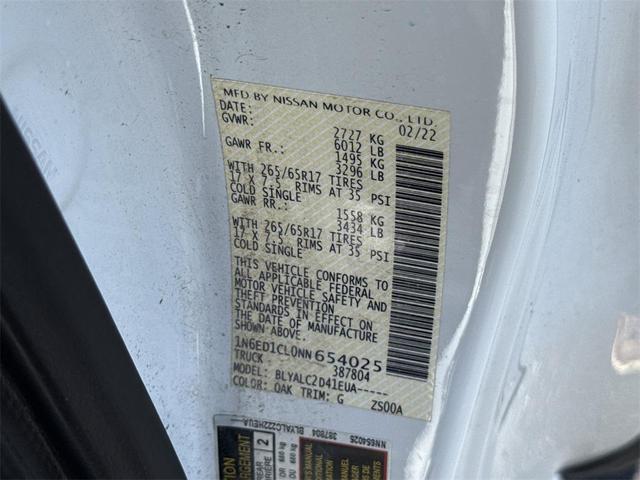 Photo of 2022 Glacier White Nissan Frontier