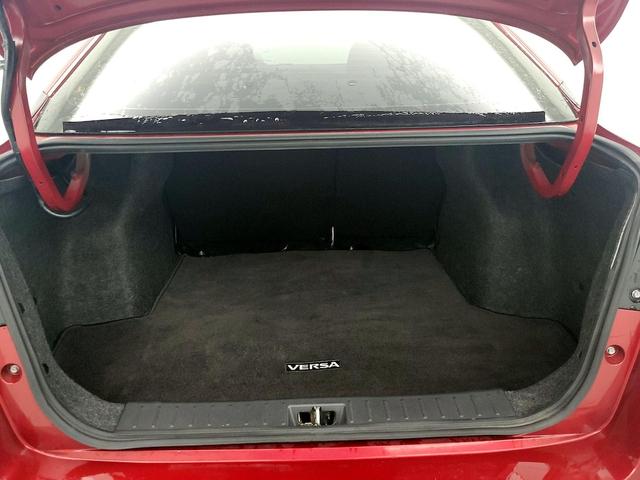 Photo of 2022 Burgundy Nissan Versa