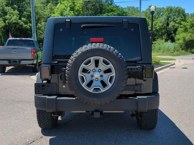 Photo of 2014 Black Clearcoat Jeep Wrangler Unlimited