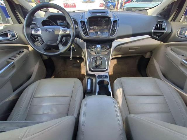 Photo of 2013 Deep Impact Blue Ford Escape
